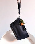Fwd: HAMIMI: SARMA TASSLE CLUTCH