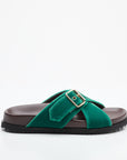 Green sandal with a strap and buckle on a white background