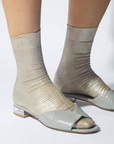 Model Wearing Maria La Rosa One Ribbed Laminated Socks in Platino