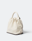 freda salvador cream bucket bag