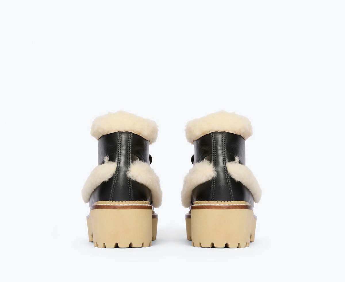 BACK OF FREDA_SALVADOR_DAKOTA_SHEARLING_BOOT_