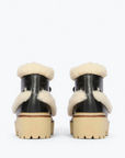 BACK OF FREDA_SALVADOR_DAKOTA_SHEARLING_BOOT_