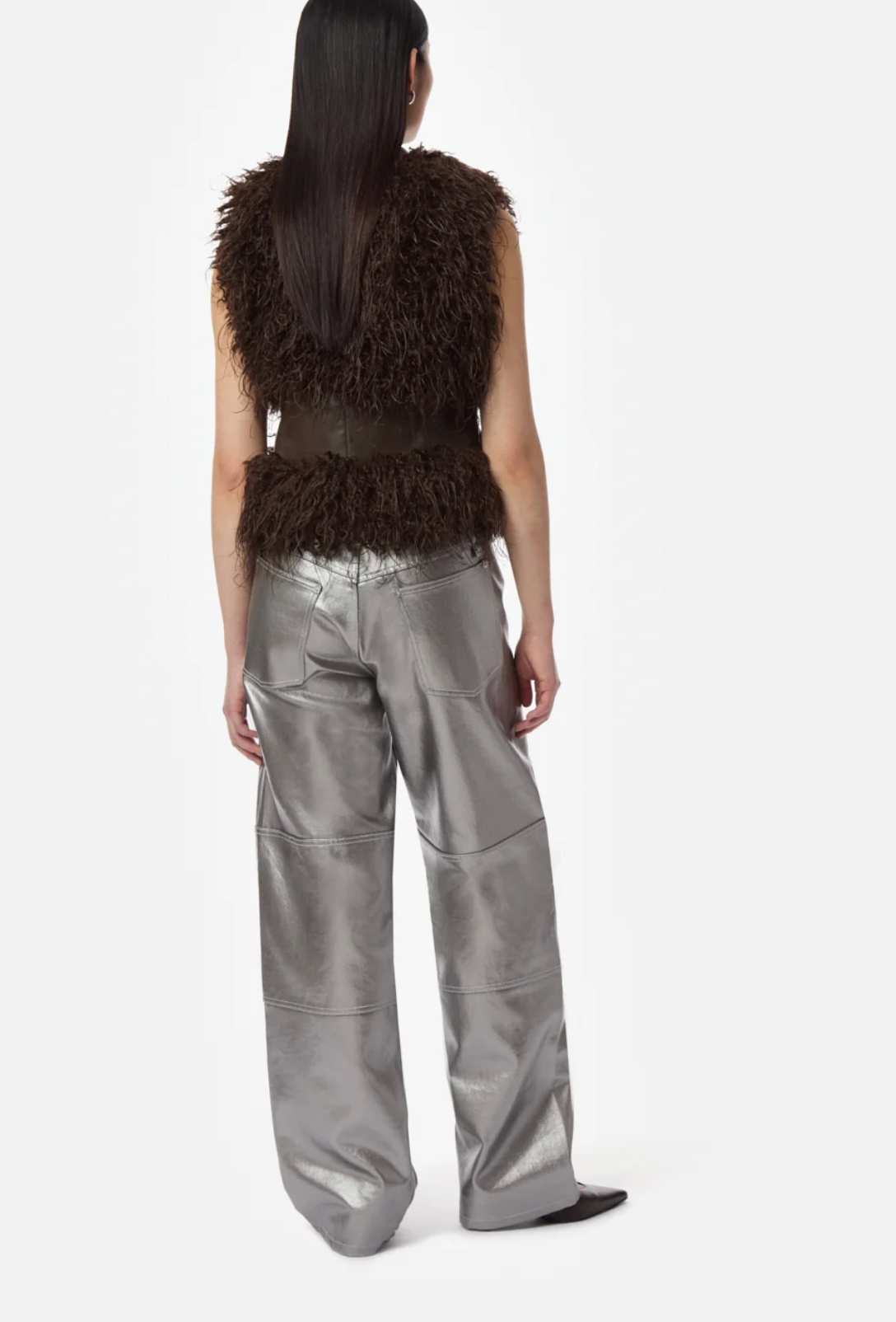 Back View Model in Apparis Cleo Mongolian Vest in Deep Brown 