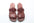 Pair of brown leather sandals on a white background