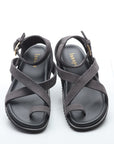 Pair of gray sandals on a white background