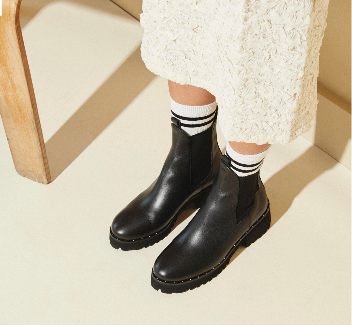 Model in Freda Salvador Brooke Rain Resistant Boot in Black Calf 