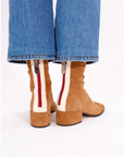 Model in NOMASEI Strada Ankle Boot in Suede Cognac 