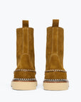 suede boots with whipstitching