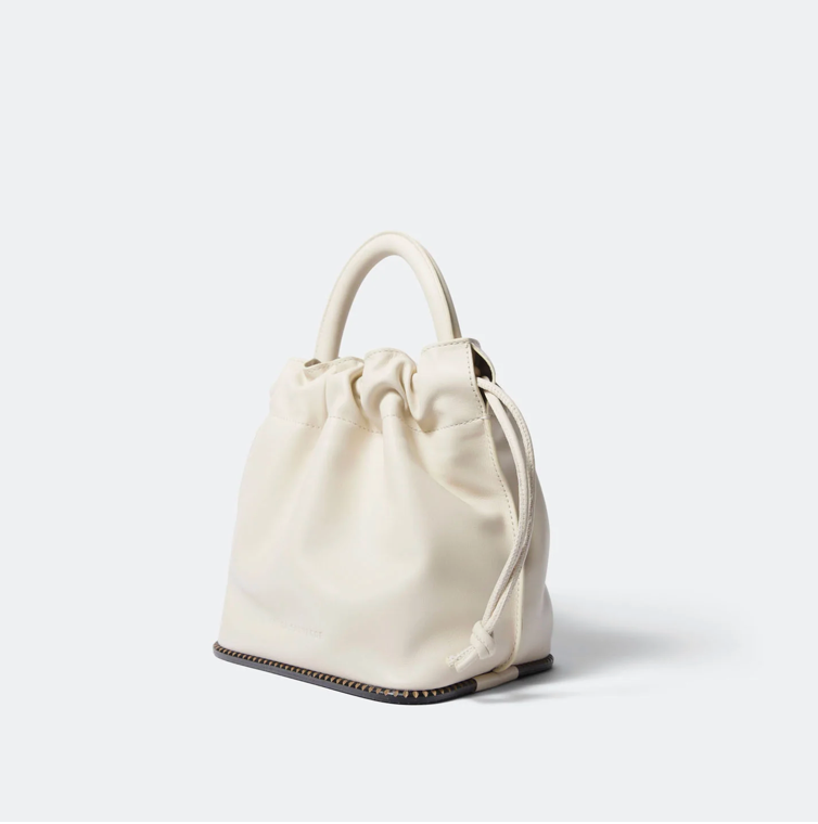 freda salvador cream bucket bag